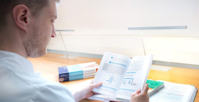 Picture A Person is reading a book